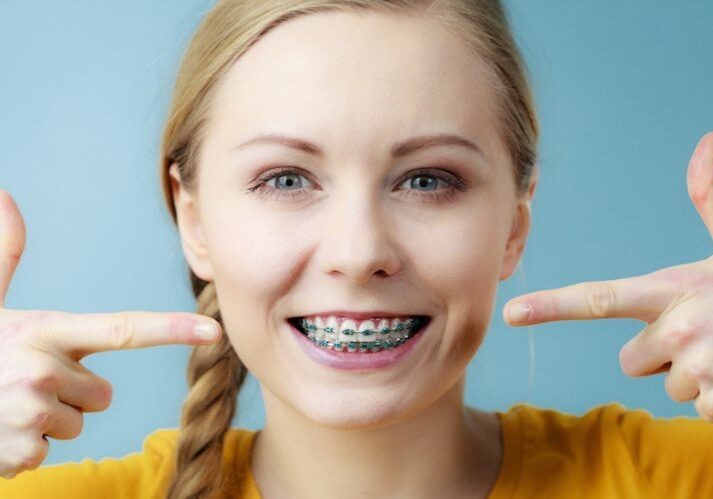 teen with braces